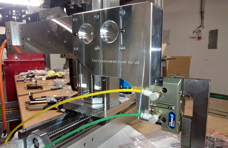 precise three-axis manipulator with servo-drives and pneumatic grippe