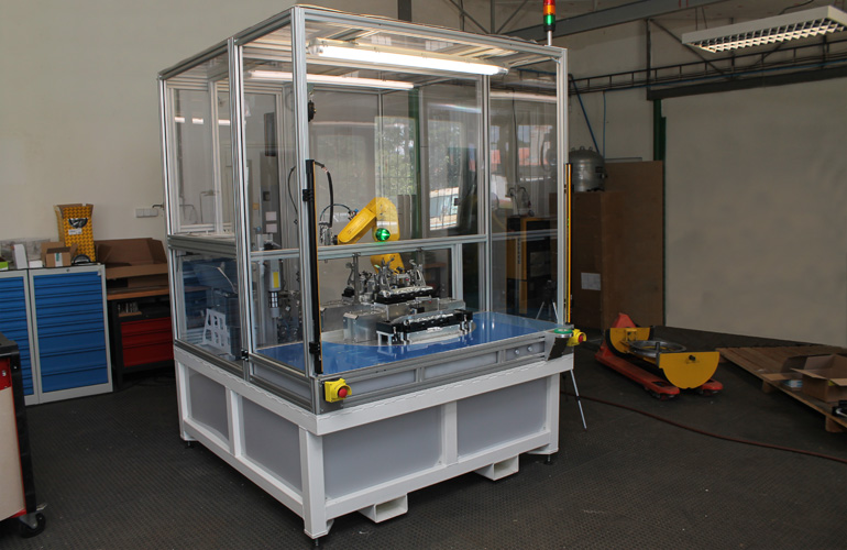 Machine is built on a robust welded frame. Working area of the operator is secured via safety light curtains.