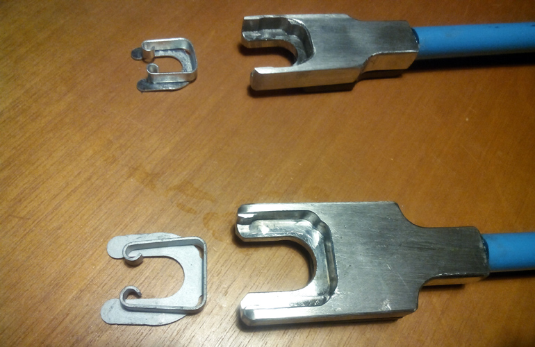 tool with magnet for snapping-on metal nuts